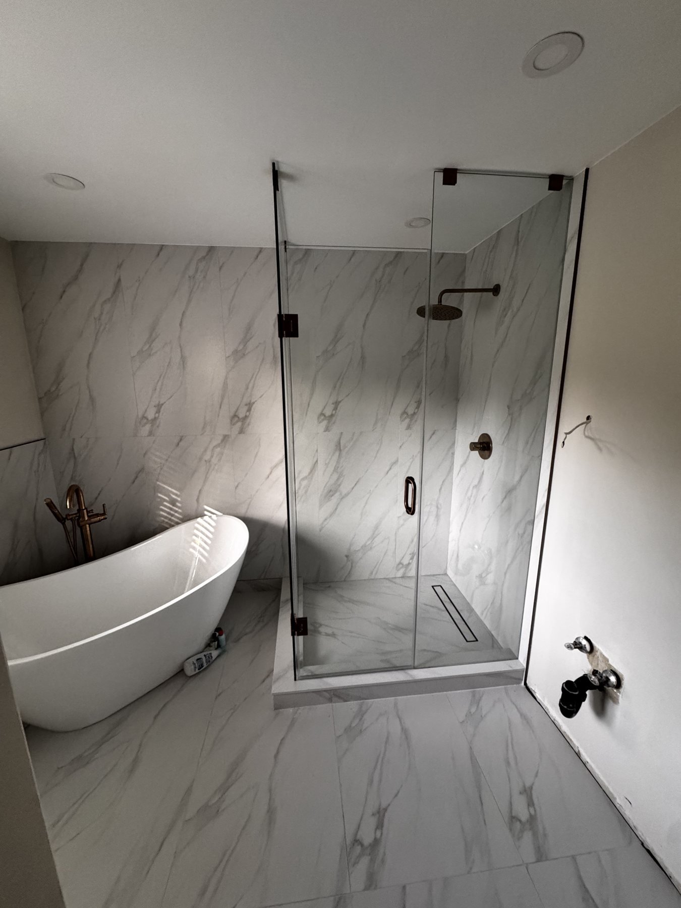 Glass shower bathroom renovation serving Oakville homeowners